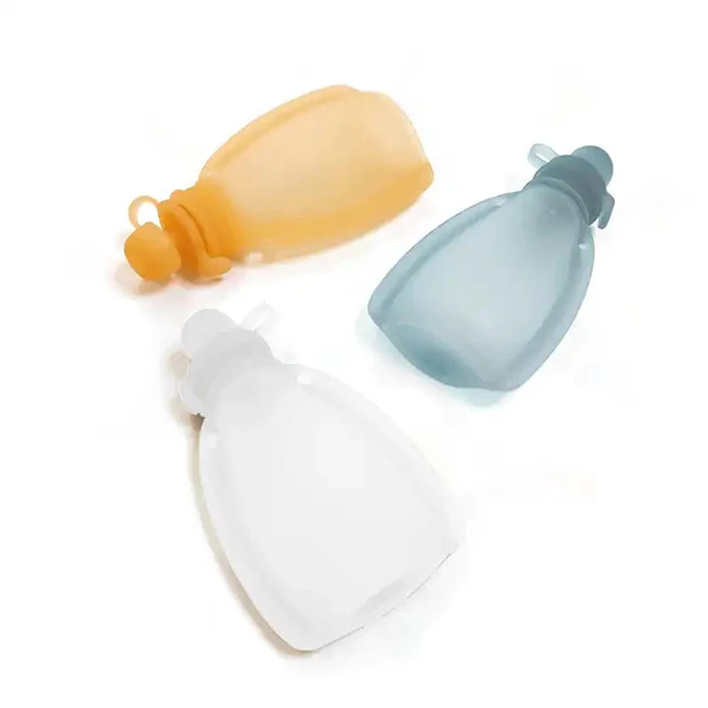 Three colorful silicone pouches on a white background