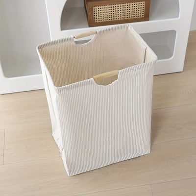 Laundry hamper featuring dual handles for easy transport and efficient home organization.